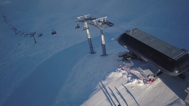 Aerial - Drone panoramic view of ski lift and the whole ski resort with their mountains in Portes Du Soleil in 4K