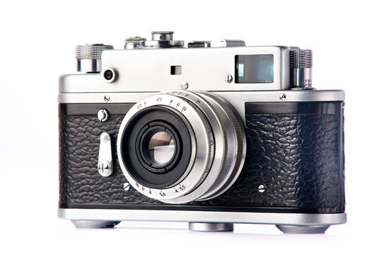 Old retro rangefinder camera isolated white
