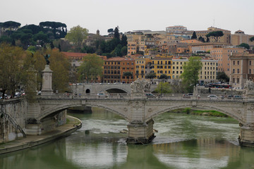 Fototapeta na wymiar A tranquil scene of water under a bridge in Rome, Italy