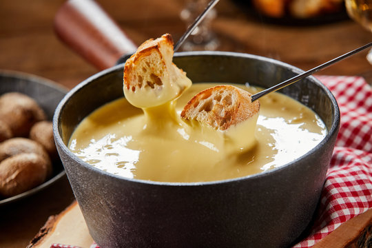 Pot of traditional Swiss cheese fondue