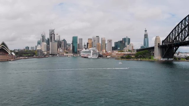 View of Sydney from the bay. Australia's main city with its skyscrapers, opera and port.