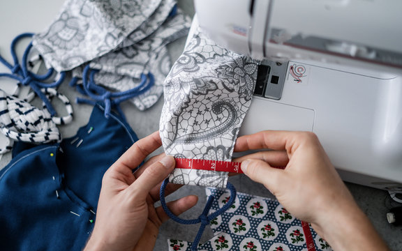 The manufacturing process exclusive of protective medical face masks. Painting, fabrics and sewing accessories for sewing an anti-virus mask. Home made diy protective mask against virus. - Powered by Adobe