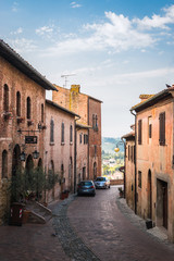 Alley in the ancient Tuscan village of Certaldo where the famous writer Giovanni Boccaccio was born and died on a summer morning