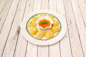 dim sum plate with sauce