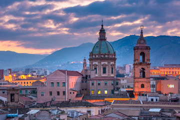 Obraz premium Closeup aerial view of Palermo with Church of Saint Mary of Gesu at sunset, Sicily, Italy