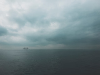 boat on the sea in a fog