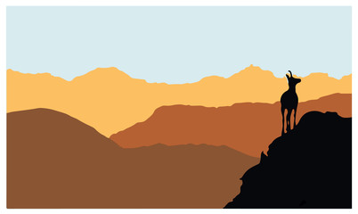 Fototapeta na wymiar A chamois stands on top of a hill with mountains in the background. Black silhouette with brown and orange background. Vector illustration.