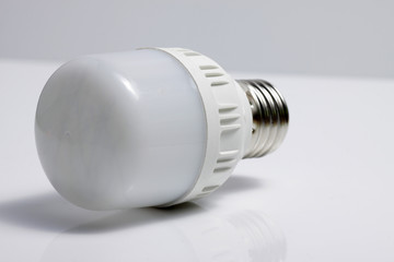 Close up shot of LED lamp with e27 type socket on an isolated white background