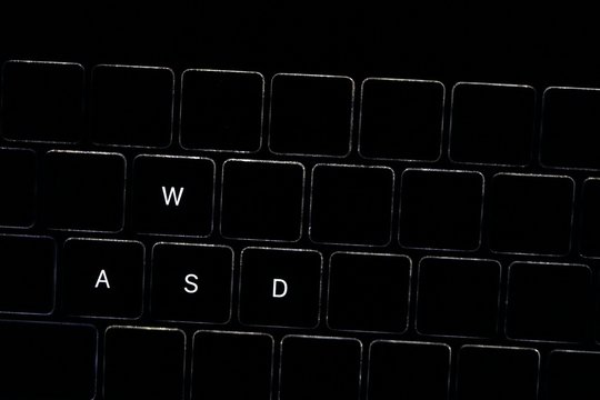 WASD, Night computer keyboard close up, gamer keyboard, neon, wasd only, isolated 