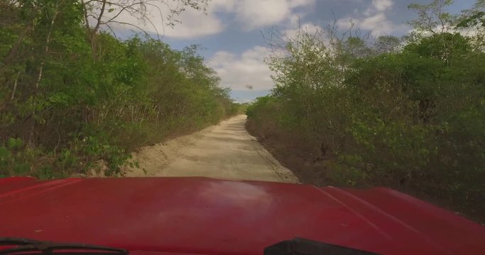 A Red Pickup Truck On A Dusty Road In Quixadá, Ceará, Brazil