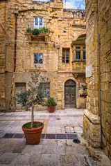 Fototapeta na wymiar Narrow streets of the old town in Birgu, Malta