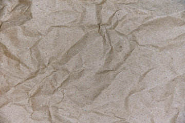 Obraz premium Clean texture crumpled light brown craft paper close-up