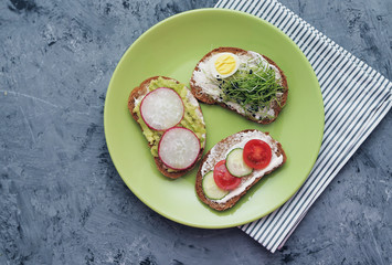 Sandwiches with healthy vegetables and micro greens.