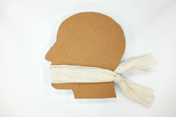 Human rights violation and failed democracy concept. Male head profile silhouette with taped stuffed mouth.