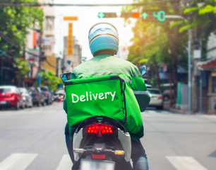 Food delivery drivers are driving to deliver products to customers who order online. Impact of epidemics