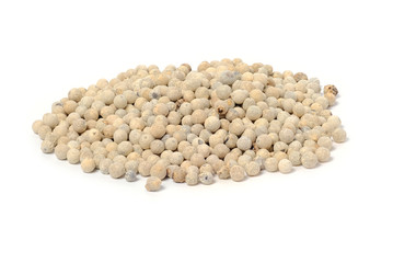 White pepper in a yellow bowl isolated on a white background.