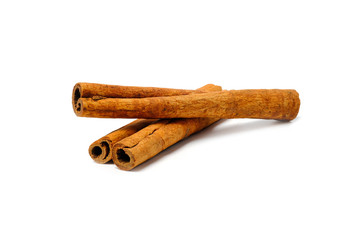 Cinnamon Sticks Stacked isolated on White background closeup macro shot
