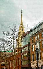 Fototapeta na wymiar Park Street Church in downtown Boston of USA reflex