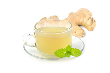 Fresh ginger juice in a glass cup on a healthy white background