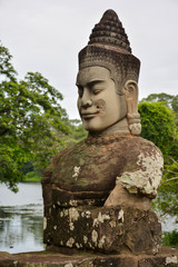 Statue of a deva (Buddhist demigod) at the entrance of Bayon Temple. Angkor Temples in Cambodia