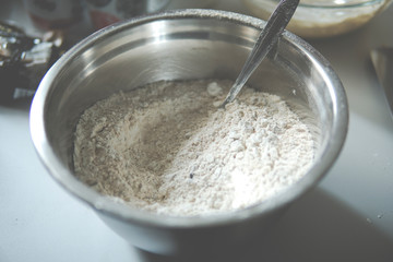 Flour inside of a metal bowl