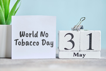 31 thirty first World No Tobacco day May Month Calendar Concept on Wooden Blocks.