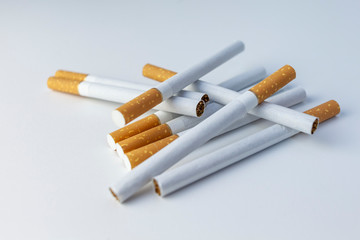 heap of cigarette on a white background