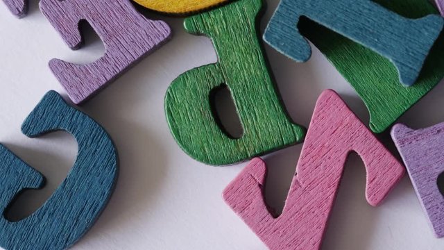 Closeup macro animation in stop motion shot of  letters of the alphabet ABCDEFG