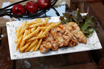 Grilled chicken with potato on isolated background