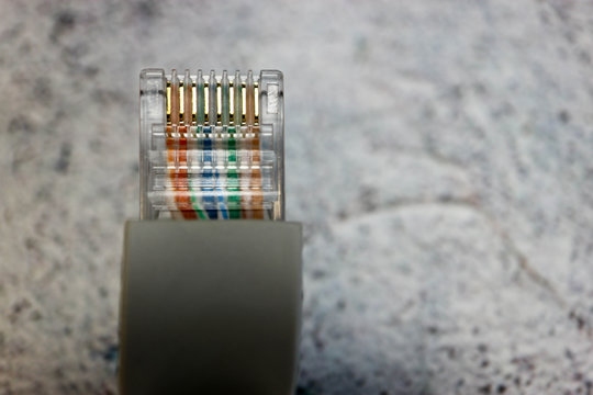 Close Up Of A Computer Network Cable With Connector Registered Jack