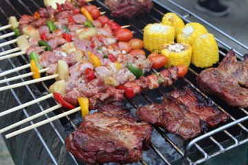 Barbeque Grill Street Food in thailand,Eat outdoors in a happy family.