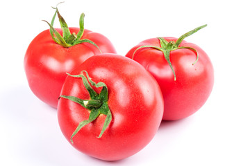 Red fresh tomatoes isolated on white background in close-up