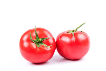 Red fresh tomatoes isolated on white background in close-up