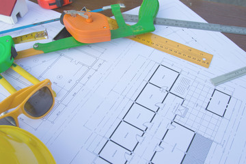 Architectural work site desk background construction project ideas concept, With drawing equipment.