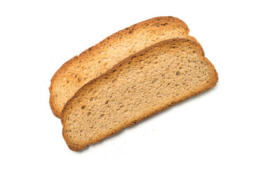 Closeup of organic crackers slices on white background