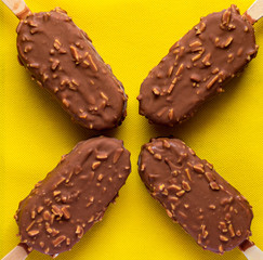 chocolate ice cream on yellow background