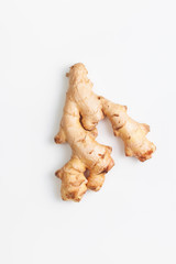 Young fresh ginger root on white background
