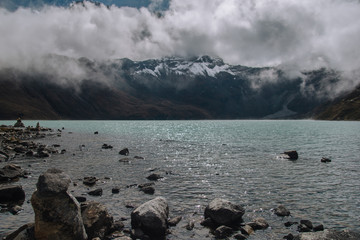 Beautiful mountain lake covered by clouds