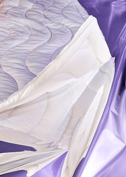 Abstract white and purple fabrics