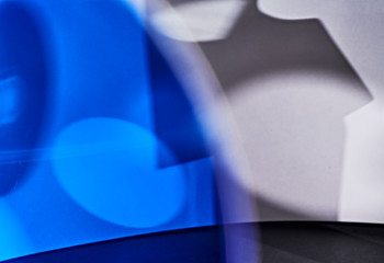 Blurred geometric shadows in blue and grey