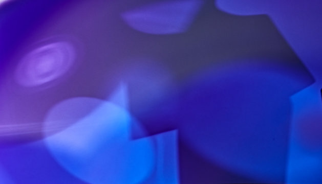 Blurred geometric shadows in purple and blue