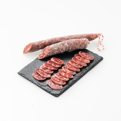 Board with delicious cured sausage