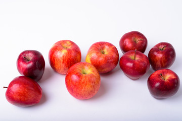 Portrait Of Fresh Red Apples Against White Background