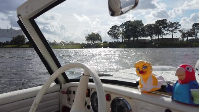 Driver Driving Car Amphibious Vehicle In Water With Rubber Duckies First Person View 