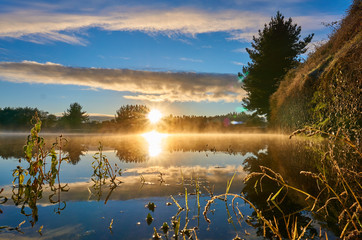 reflections in lagoon at sunrise