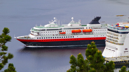 Famous Norwegian Hurtigruten on classic post ship or cruiseship or cruise ship liner MS Nordnorge...