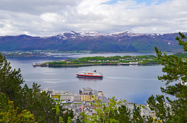 Famous Norwegian Hurtigruten on classic post ship or cruiseship or cruise ship liner MS Nordnorge...