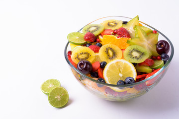 Portrait Of Assorted Delicious Fruits Against White Background