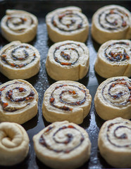 Homemade sweet traditional dessert, pastry snails on baking tray