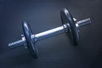 Metal dumbbell isolated